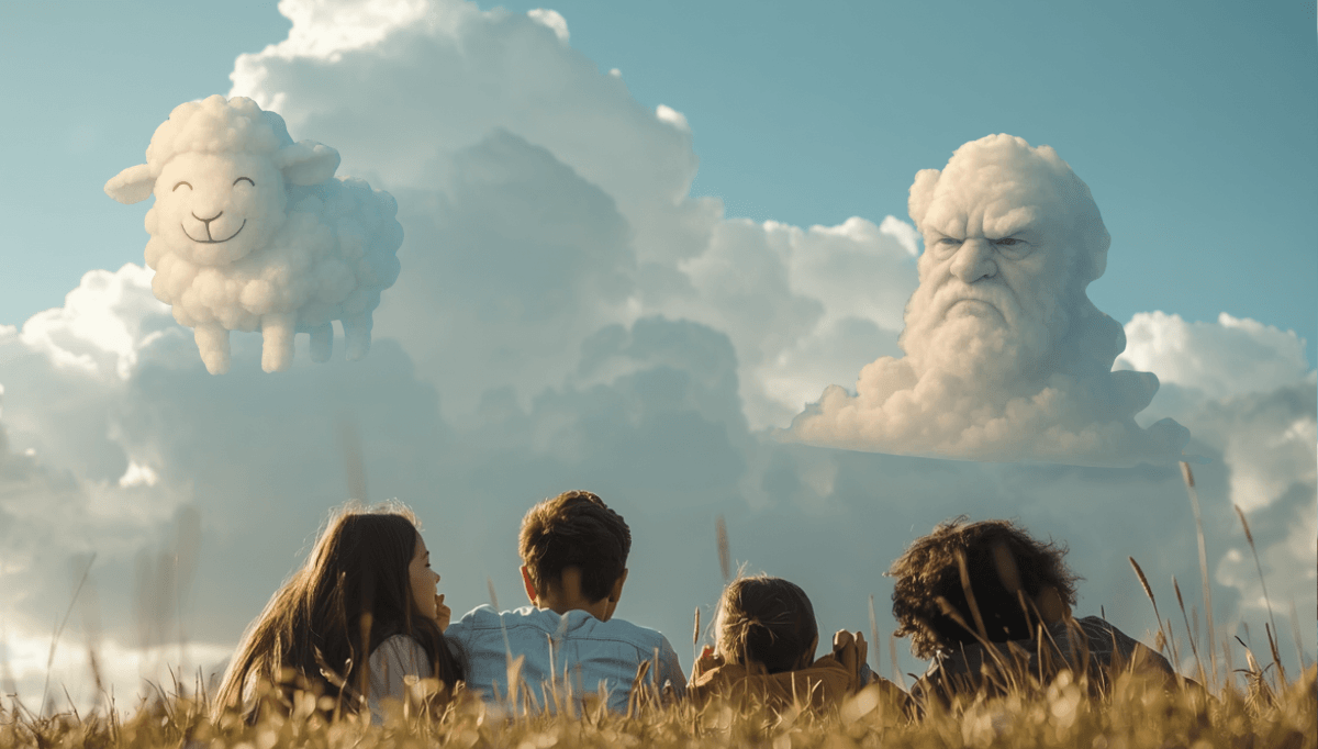 children lying in grass looking at clouds shaped like characters to encourage talking about feelings