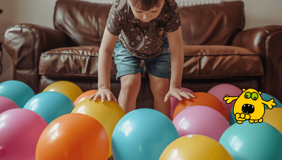 child popping colourful balloons as a playful activity to help let go of worries