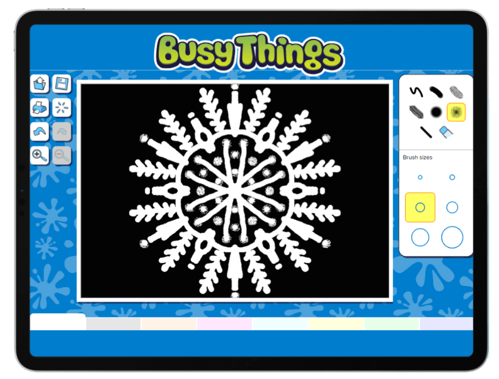 Easy snowflake activity for kids - making symmetrical snowflakes 